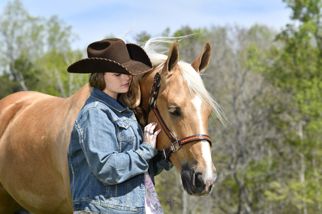 Lexi Edsall and her palomino quarter horse Shiner Surprize